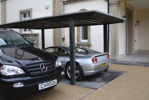 James Bonds Style Garage Allows More than One Car in the Same Place -3